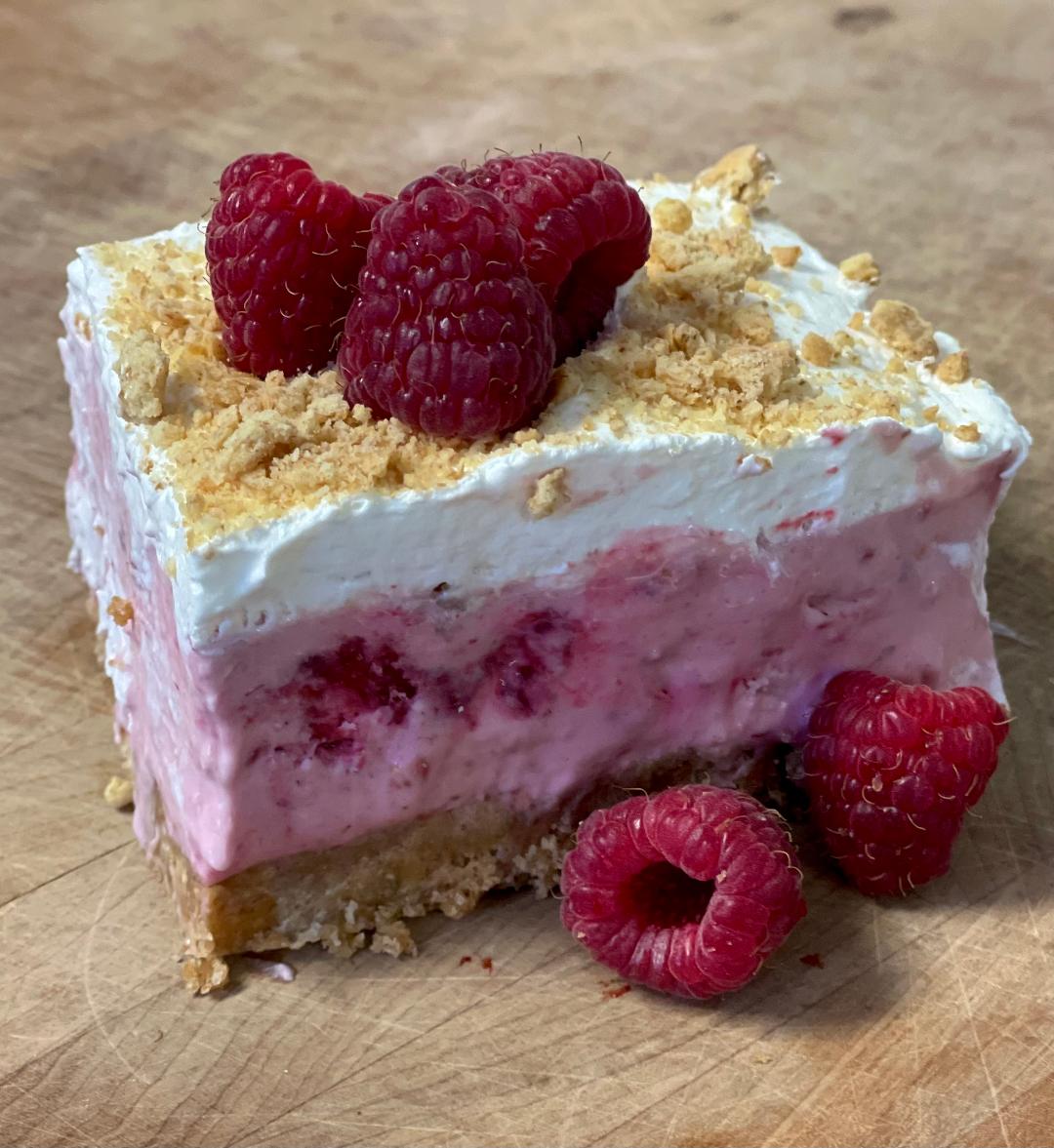 a slice of frozen raspberry dessert